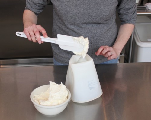 Start transferring icing into your piping bag.
