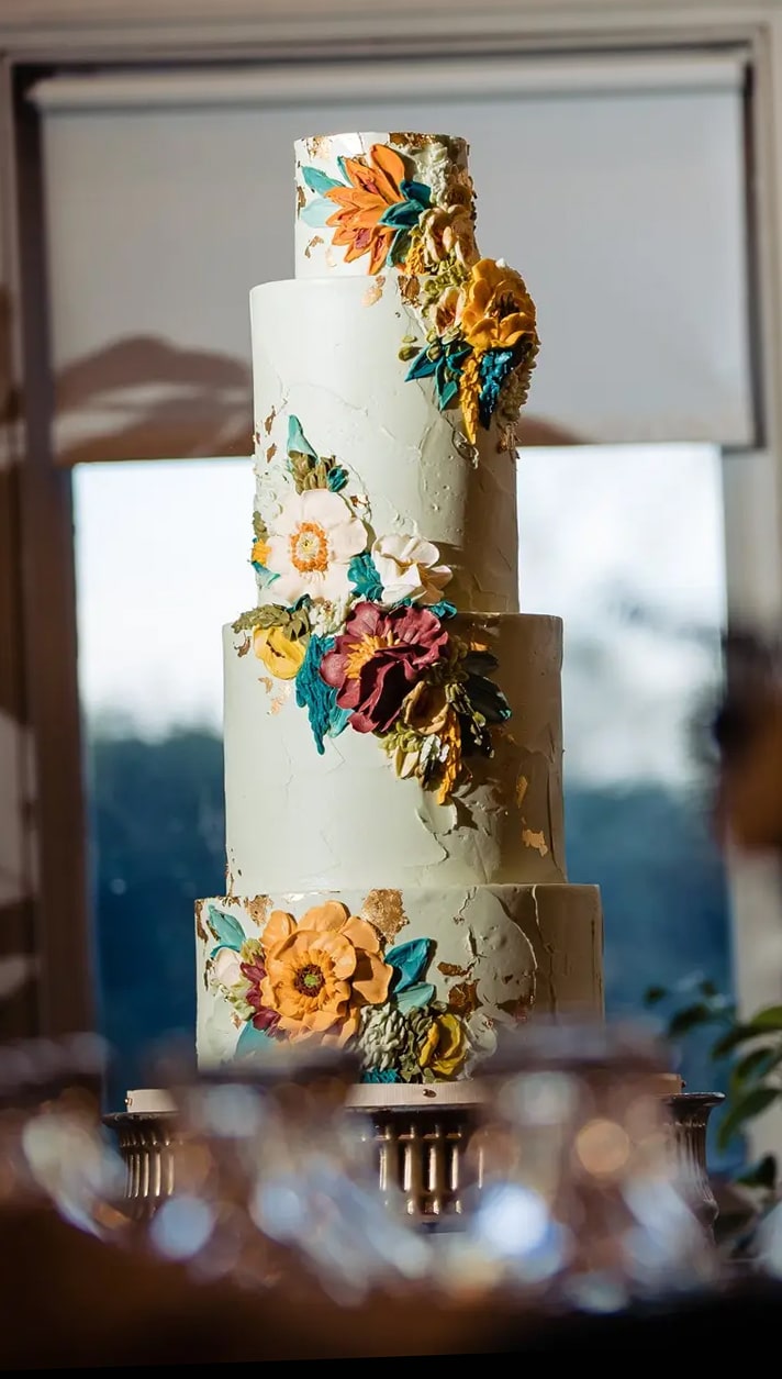 Tiered buttercream floral wedding cake by Whipped Bakeshop in Philadelphia